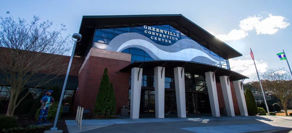 A photograph of the Greenville Convention Center's facade.